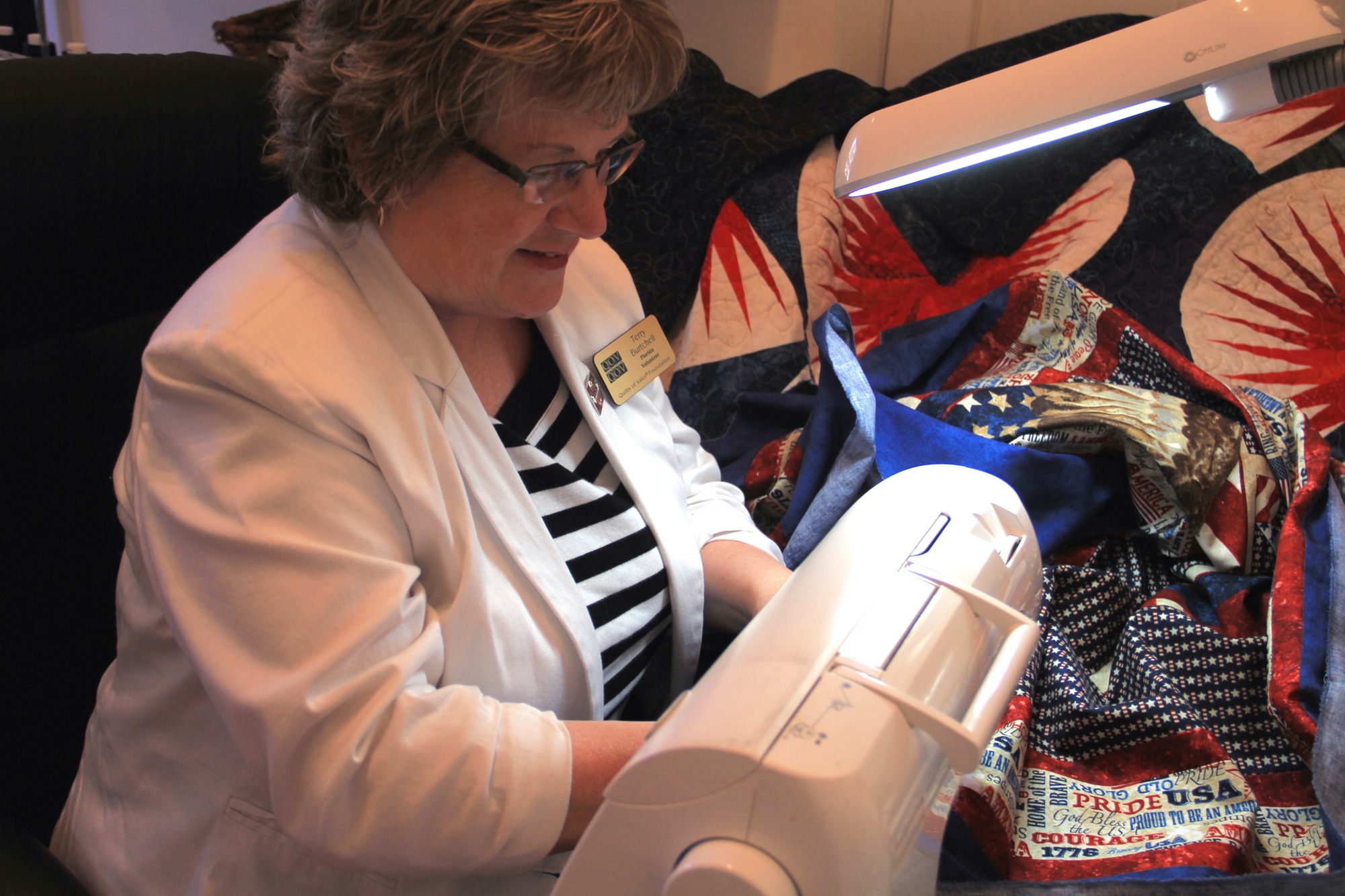 Terry Burtchell, Volusia County QOV group leader, works on a quilt. Photo by Nichole Osinski