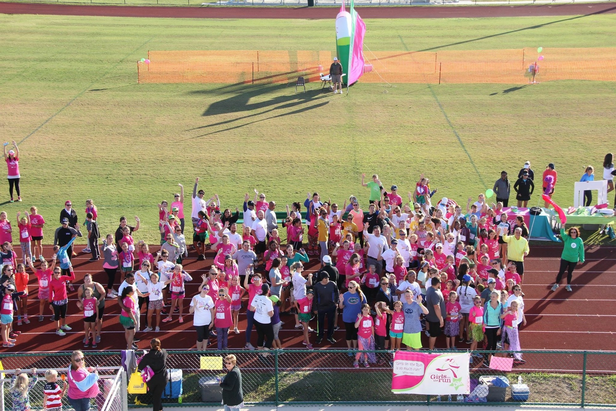 Volunteers and students of Girls on the Run pose for a photo during the 5K event. Photo courtesy of Ashley Novak