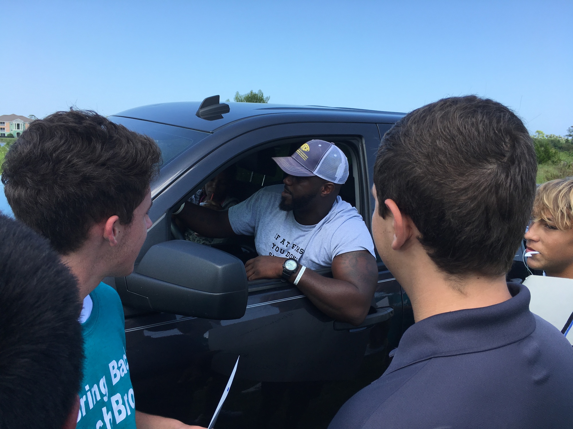 Benjamin Antwan Brown talks with students at the protest. Photo by Nichole Osinski