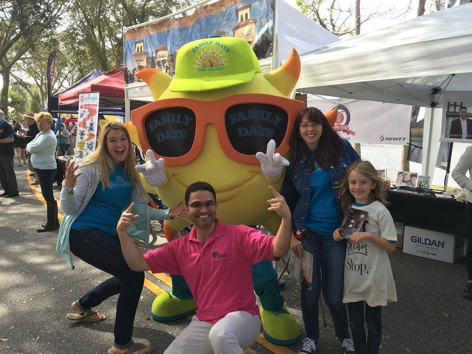 Residents pose with Shades the mascot for Family Days. Photo courtesy of Port Orange Community Trust