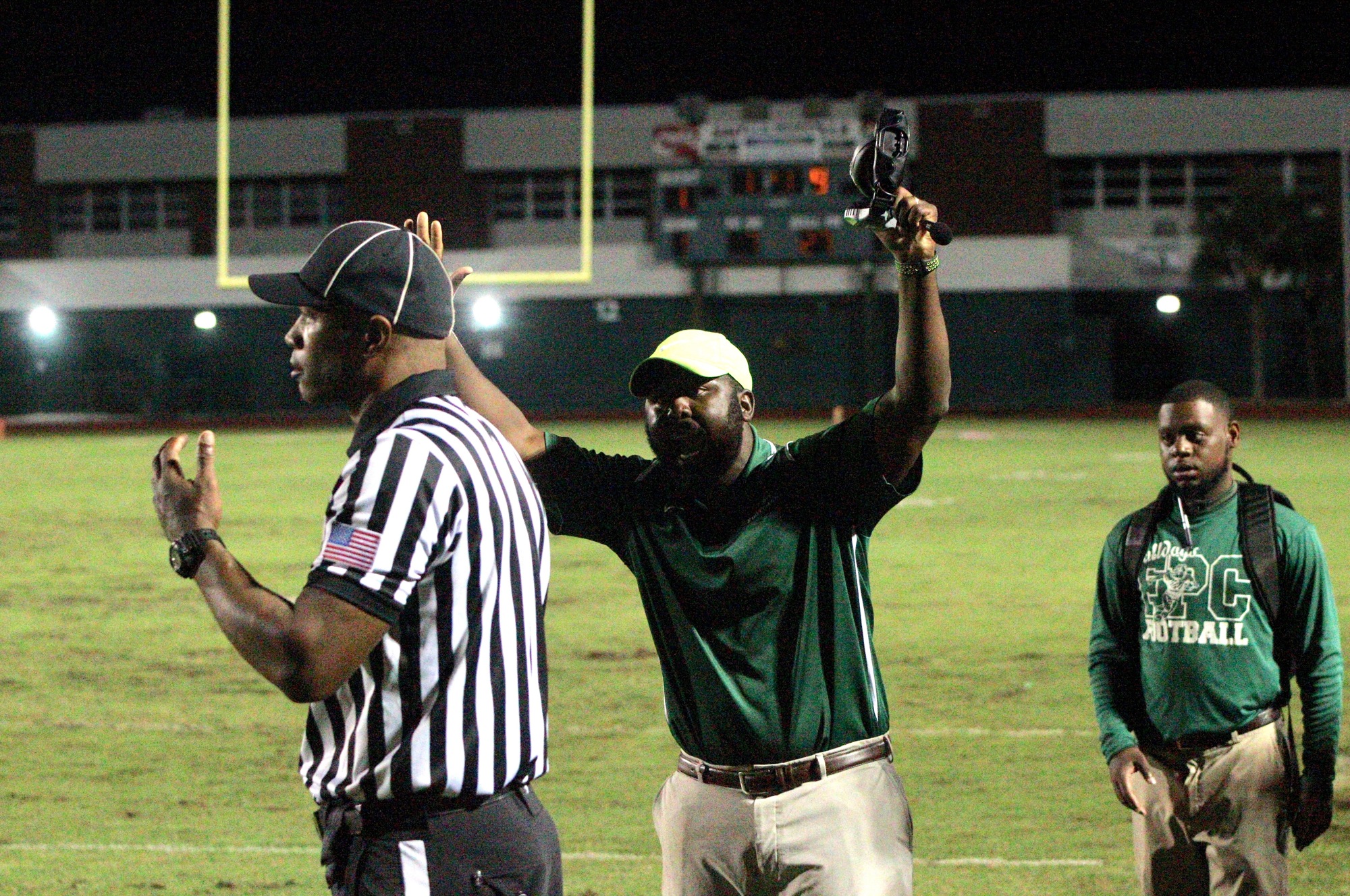 FPC coach Travis Roland argues with a referee after a questionable call in the first quarter against Deltona. Photo by Ray Boone