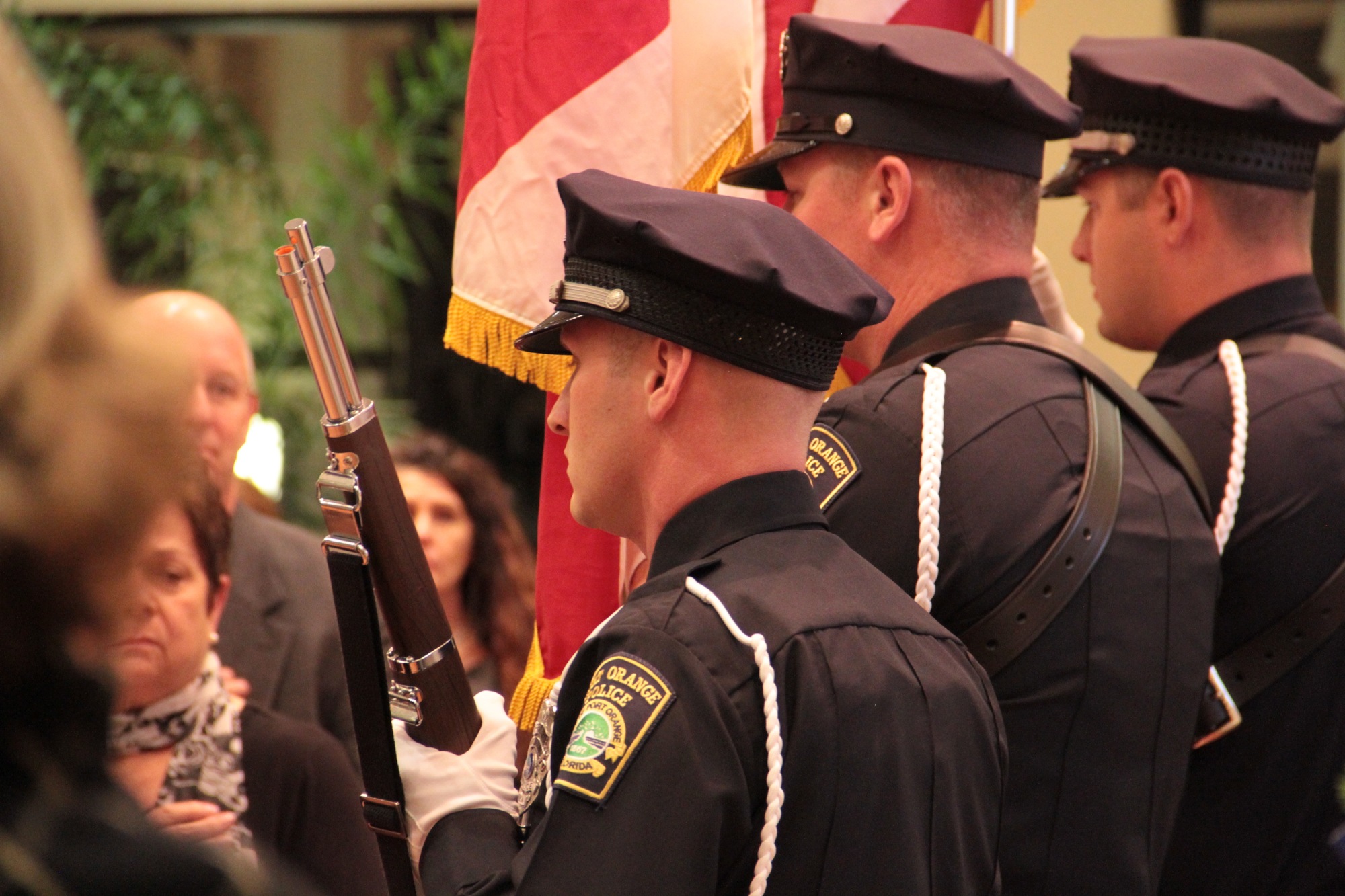 The Port Orange Police Department Color Guard present the colors. Photo by Nichole Osinski