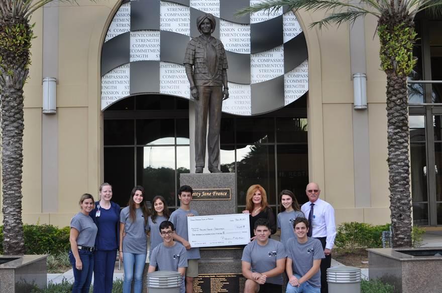 Front:: Demetri Andreoulas, Vangeli Pavgouzas and Nicholas Karamitos. Back: Raven Kastis, Nurse Manager Amy Christie, Alexia Kastis, Cindy Samaan, Jason Brown, Foundation President Mary Bennett, Mia Striegel and Foundation Executive Director Joe Petrock.