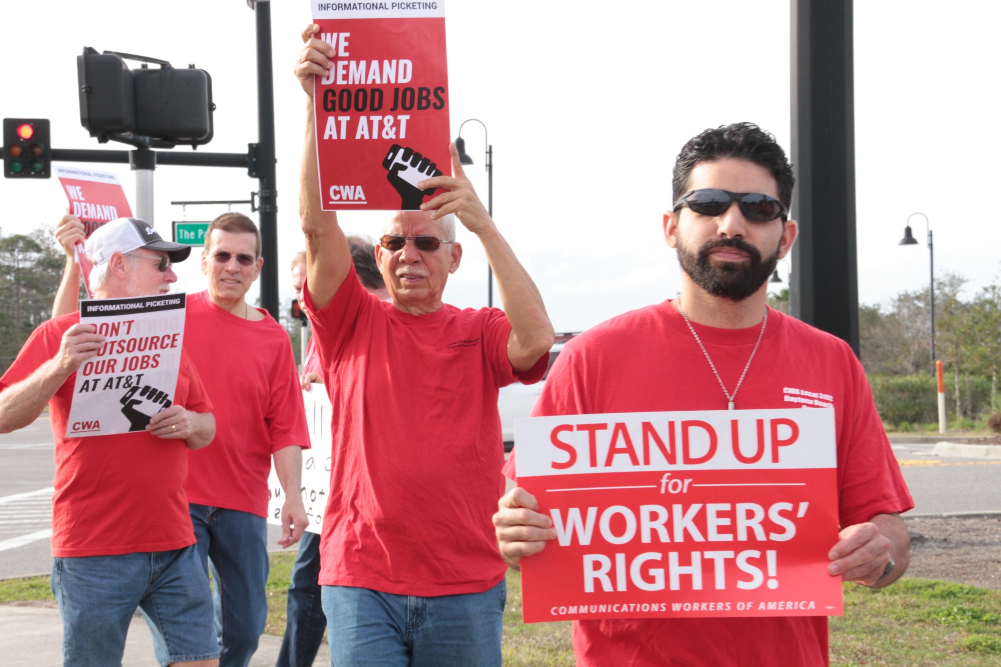 AT&T communications workers and union members protested at The Pavilion on Friday, Feb. 9. Photo by Nichole Osinski