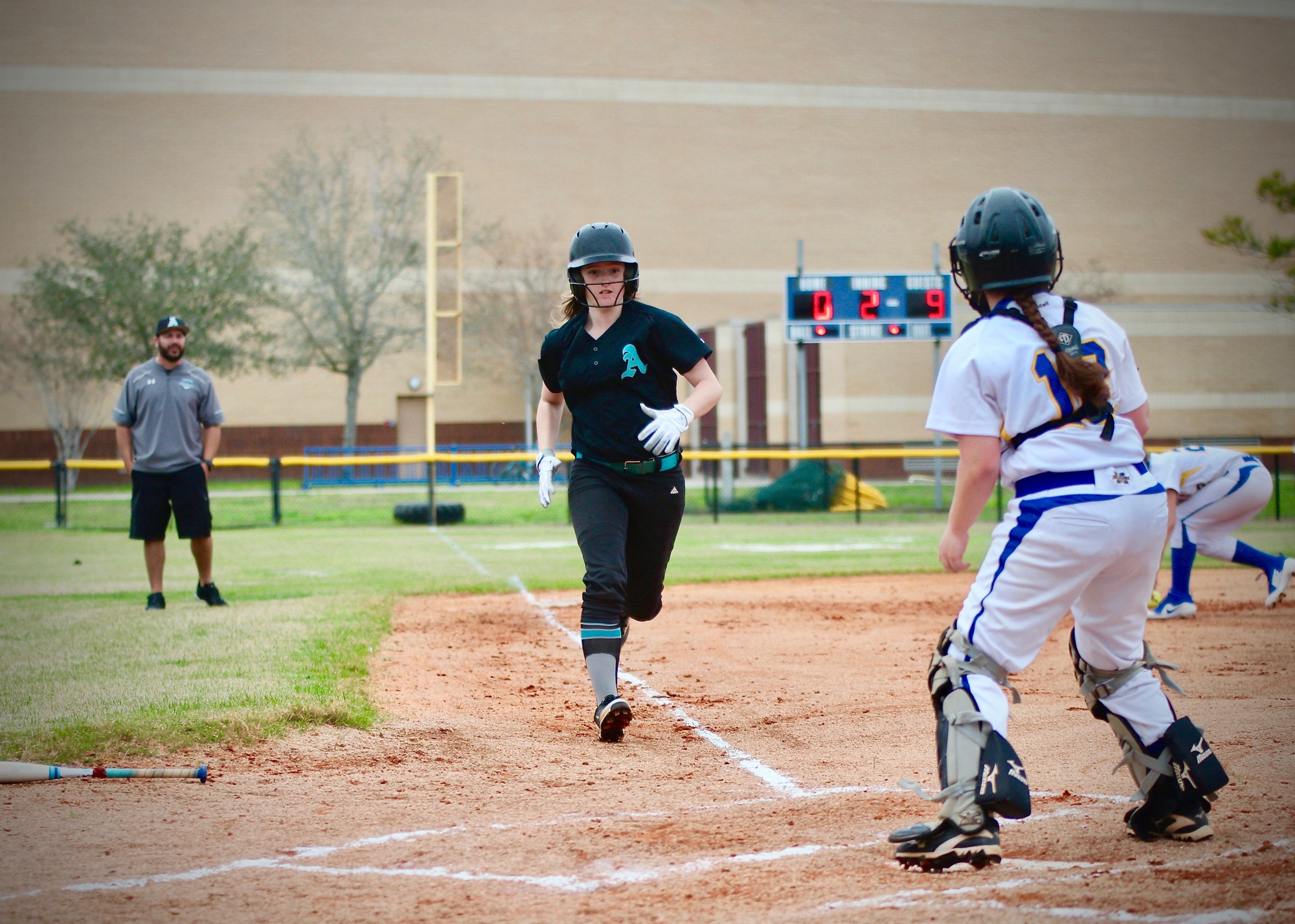 Atlantic's Adriana Boss runs to home plate against Mainland. Photo by Ray Boone
