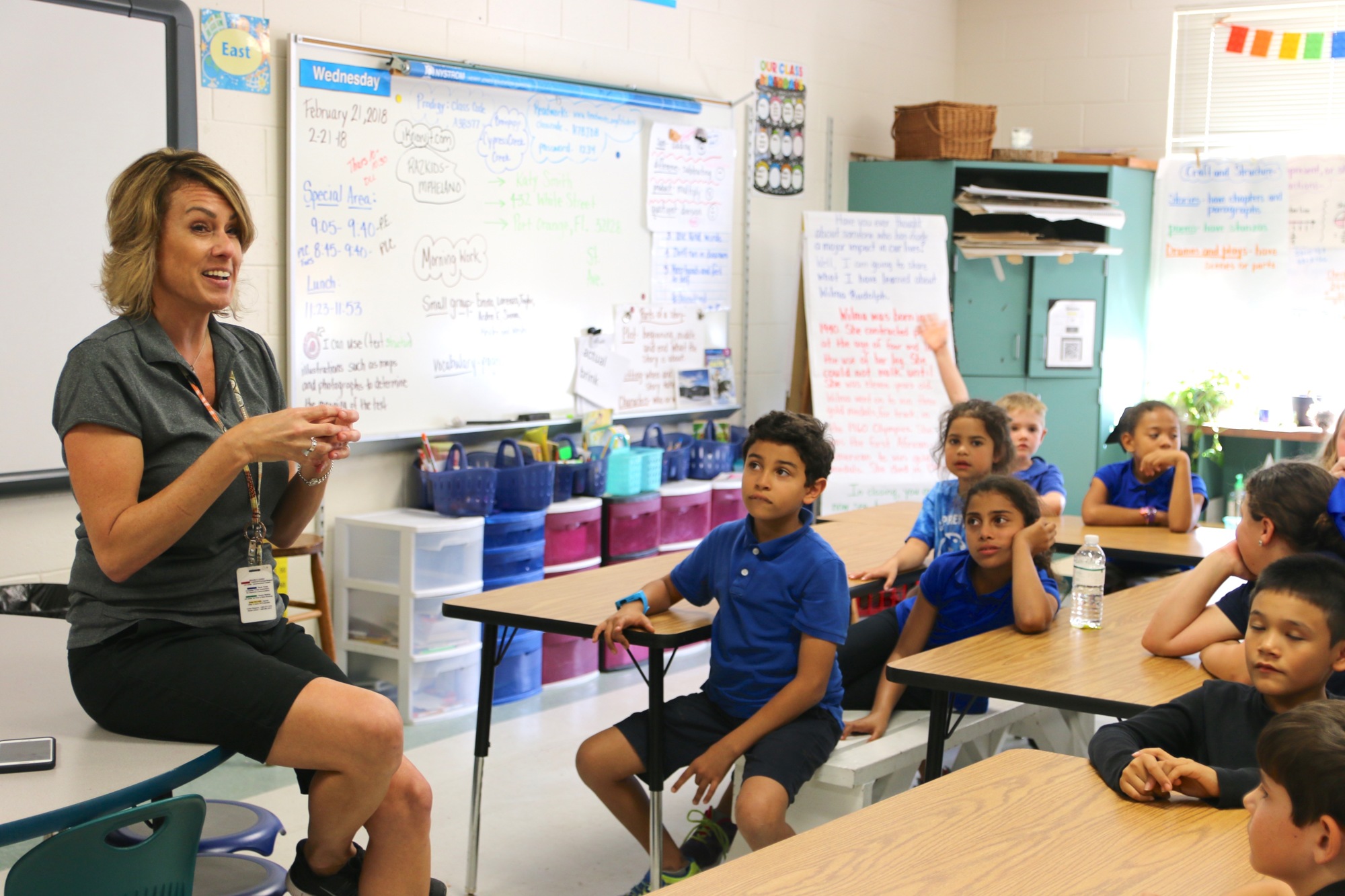 Teacher Michelle Phelan speaks with Cypress Creek Elementary students. Photo by Nichole Osinski