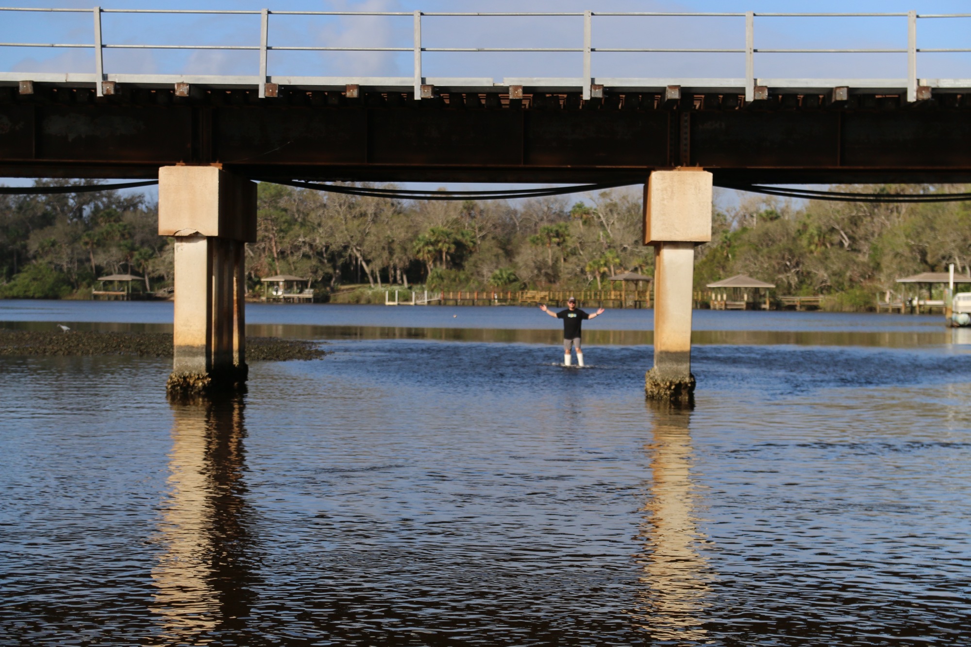 Robert Lloyd stands near the train trestle at Spruce Creek. Photo by Nichole Osinski