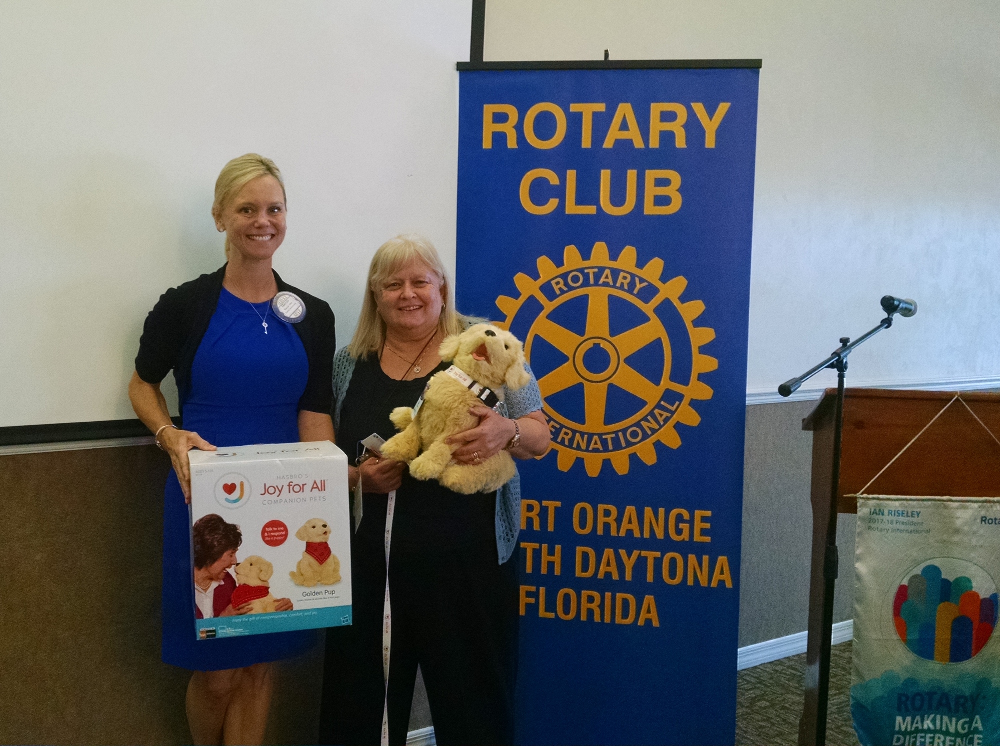 Maryjo Allen, Executive Director of Halifax Health Hospice  and Robin Canady holding BJ. Photo courtesy of Nancy Schaaf