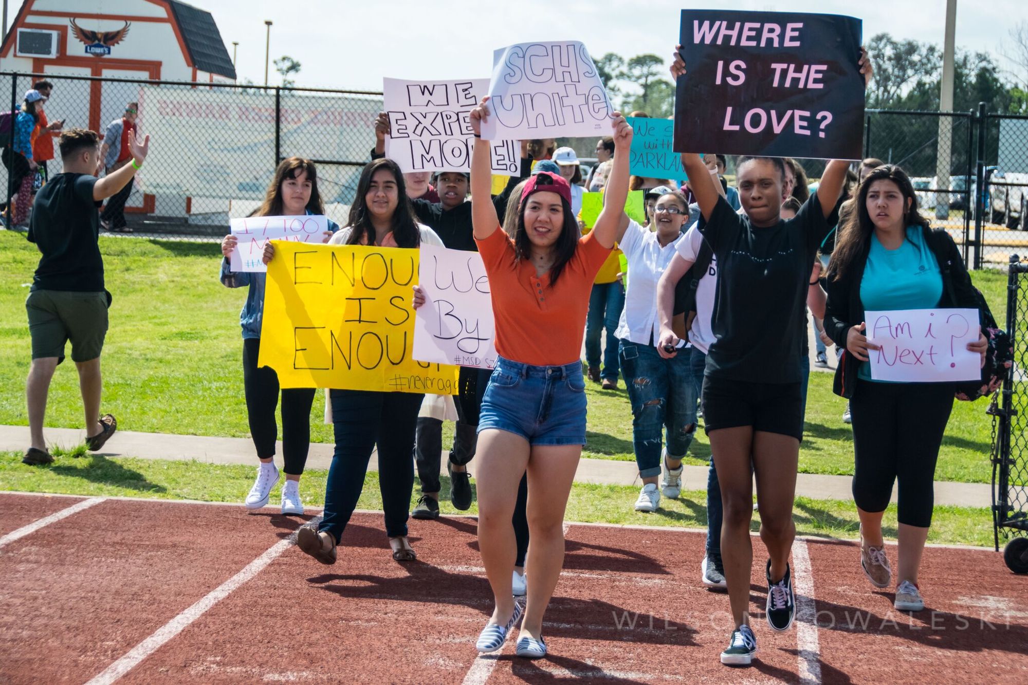 Spruce Creek students hold signs during a Unity Walk. Photo courtesy of Wilson Kowaleski