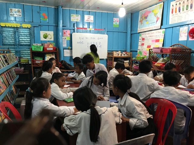 Cambodian children studying in their classroom. Photo courtesy of the Port Orange-South Daytona Rotary Club
