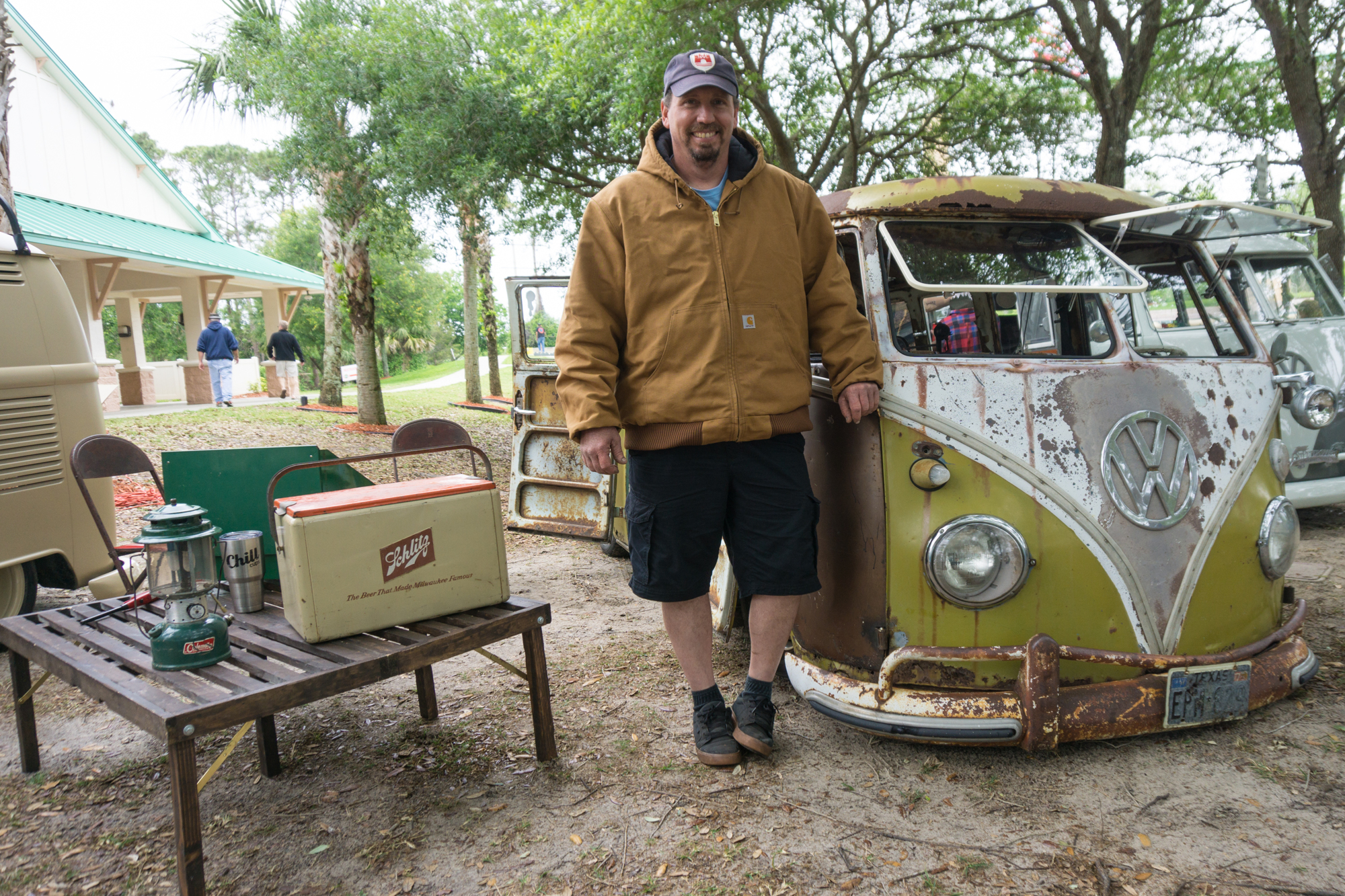 Ryan Lowther standing next to his custom Volkswagen 