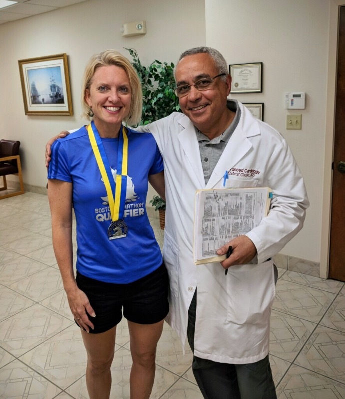 Jenny Enslin and Dr. Ashraf Elsakr, who signed Enslin's medal. Photo courtesy of Jenny Enslin