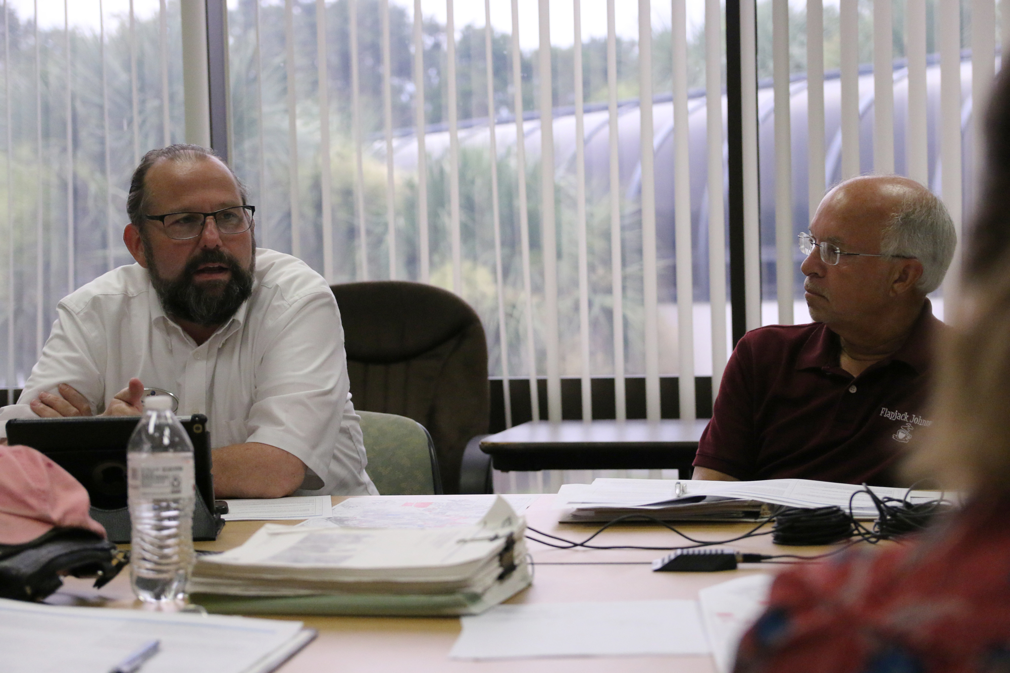 Environmental Advisory Board Member Newton White speaks about tree preservation as Chairman John Macaluso looks on at the board's meeting on Monday, July 23. Photo by Jarleene Almenas