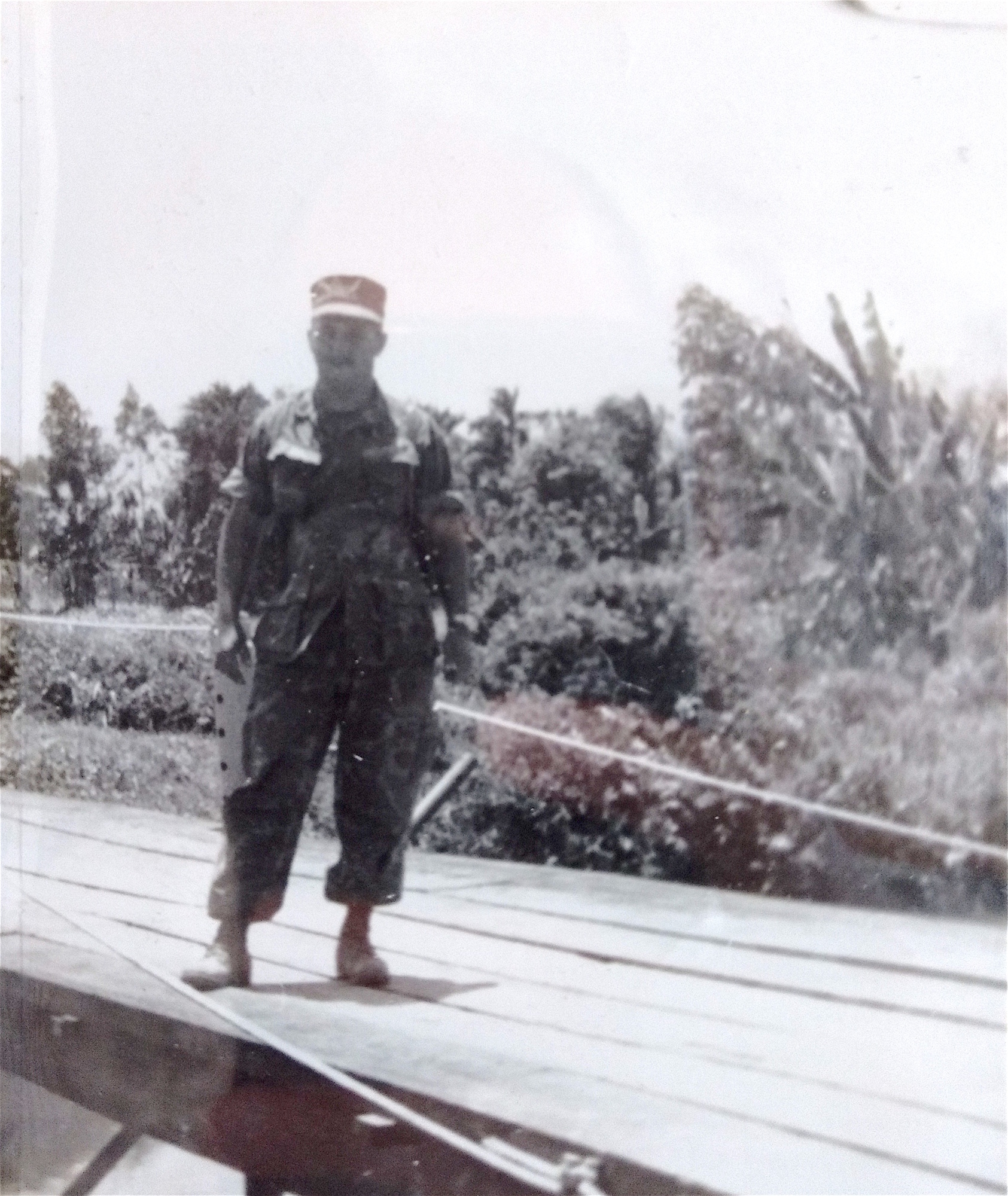 Pedro Lopez-Torres stands on the bridge in 1970-1971 in Vietnam.