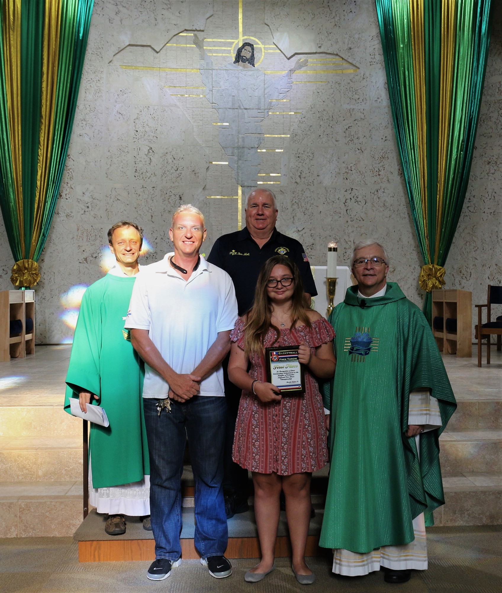 Pictured with Jessica Senft and her father, Tom, are Deacon Mike Rosolino, Fr Chris Hoffman and Grand Knight Tim Mell.
