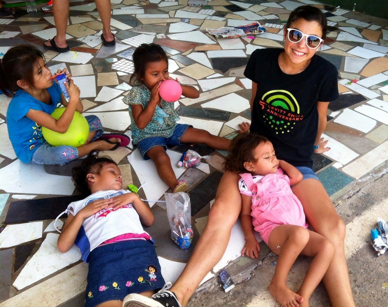 Hernandez wears out the kids at an orphanage in El Salvador. Courtesy photos