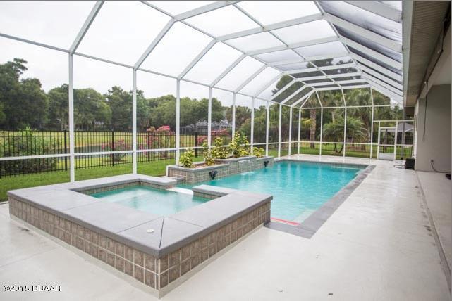 The pool in the top selling house is salt water and is solar heated.