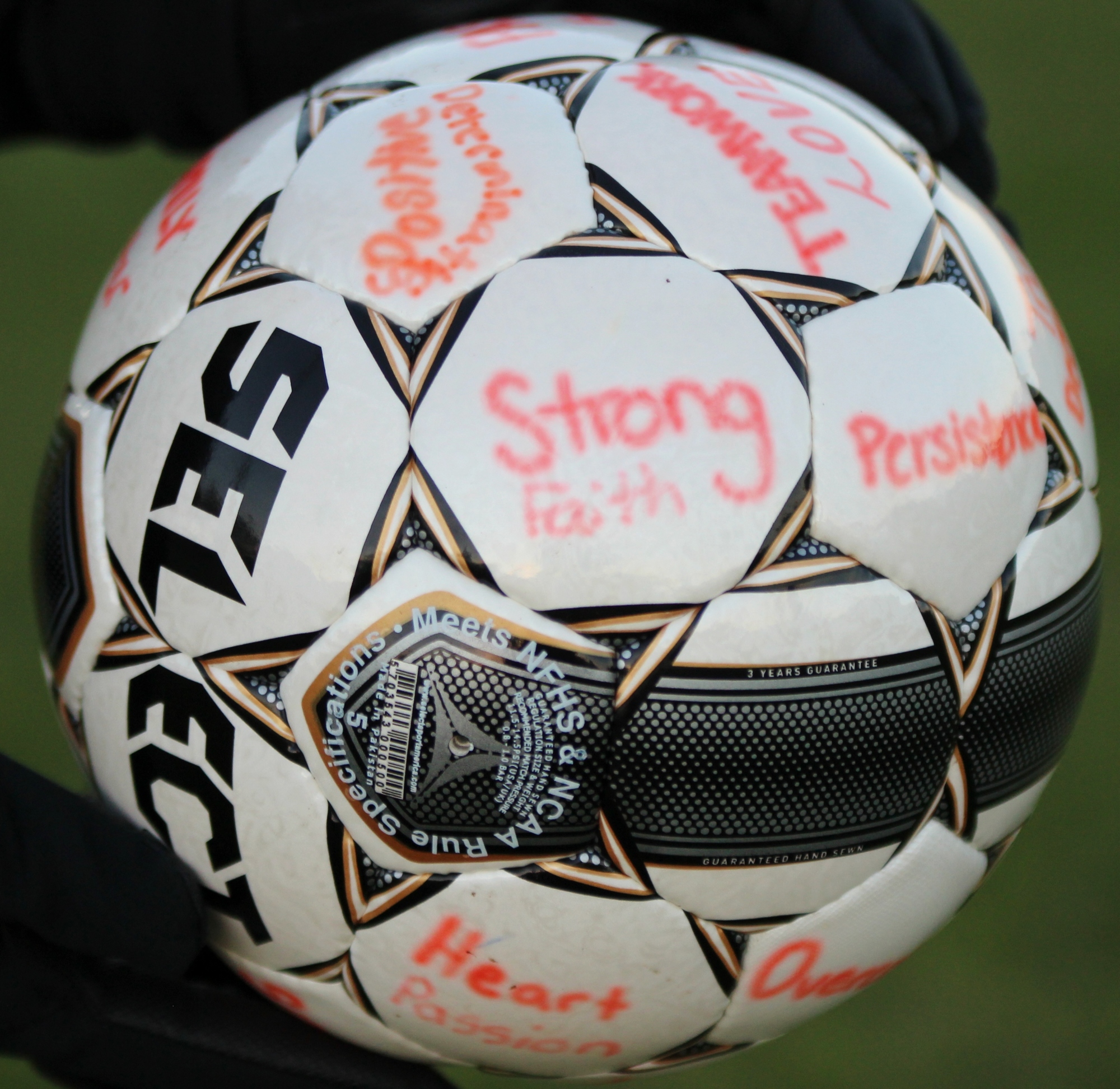 Before the season, every player wrote a meaningful word on their spirit ball, which is carried by coach Kim Merkel throughout each game, never allowing it to touch the ground. They will use one of these words to do the team breakdown before the game.