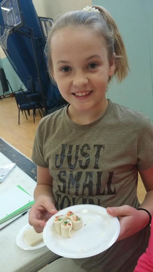 Skylar Martin joined in the fun at the Ormond Beach Family YMCA Cooking Club Enrichment Program (Courtesy photo).