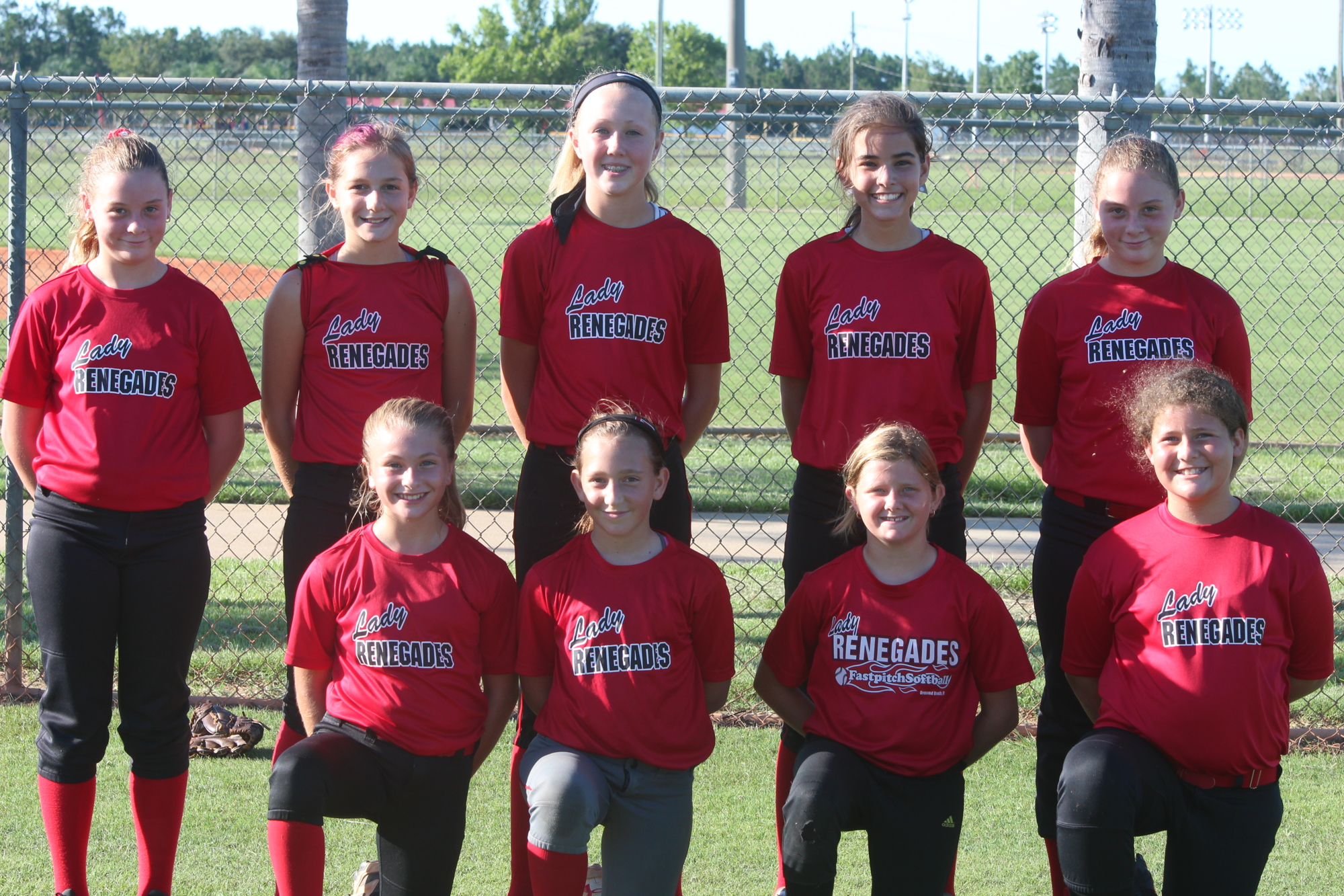 The 12U Ormond Beach Lady Renegades pose for a photo on Thursday, July 6 at practice at the Ormond Beach Sports Complex.