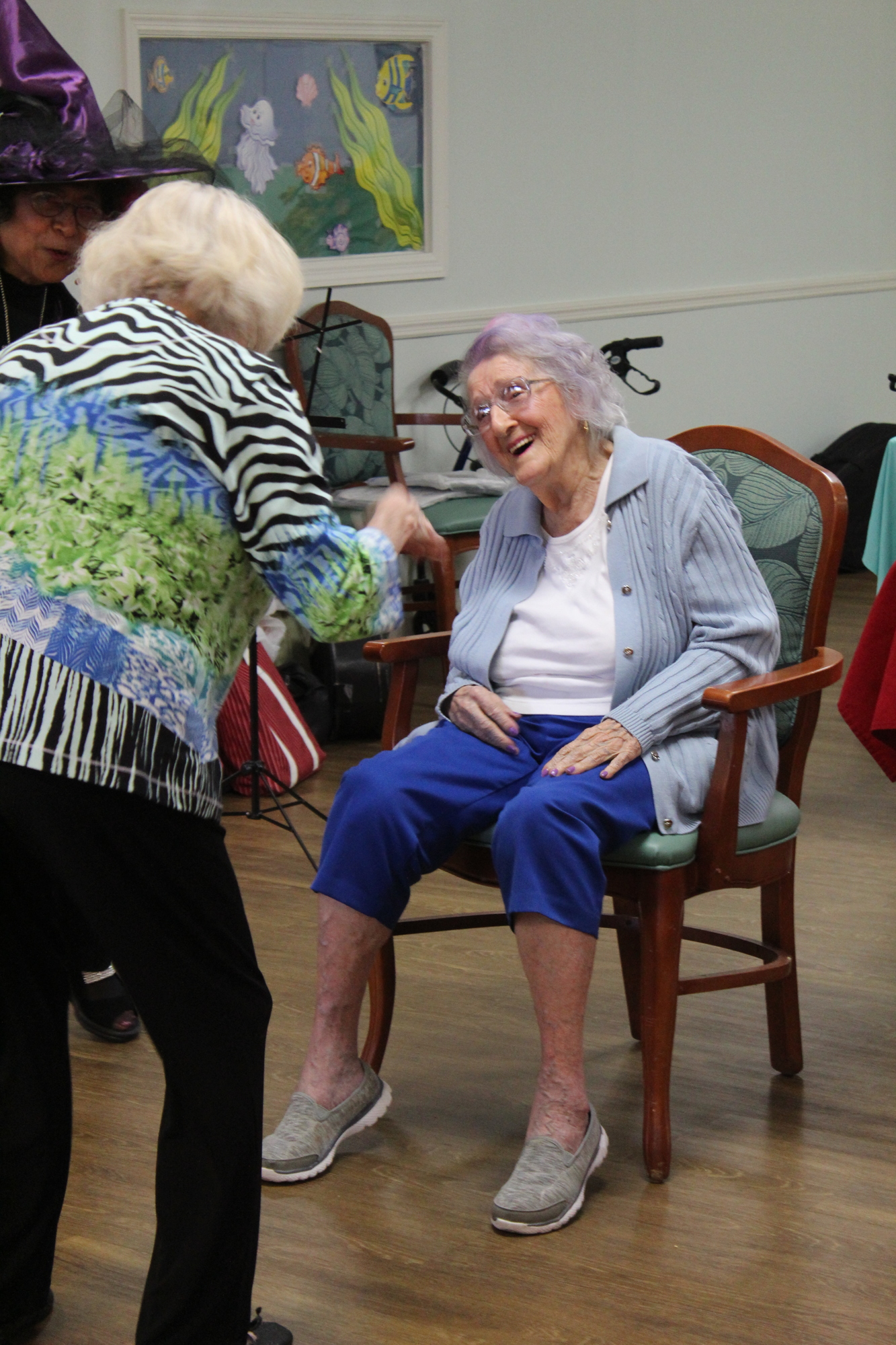 Erma Mohl dances with a longtime friend at her 103rd birthday party on Monday, Oct. 30. Photo by Jarleene Almenas