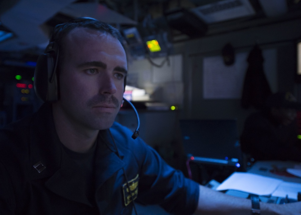 Lt. Martin Dineen monitors the Tactical Action Officer Console aboard the USS New York on Nov. 1. Photo courtesy of U.S. Navy Mass Communication Specialist Seaman Michael Lehman