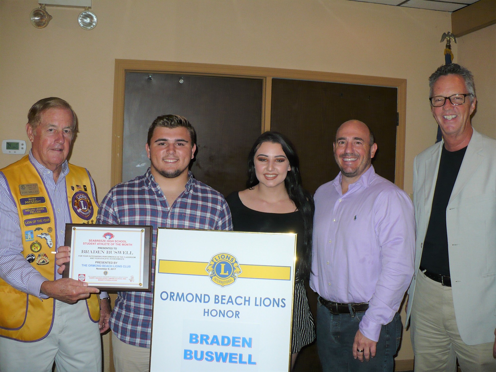 First Vice President Tom Millen, Braden Buswell and Brittany, Steve Buswell and Principal Joe Rawlings. Photo courtesy of the Lions Club