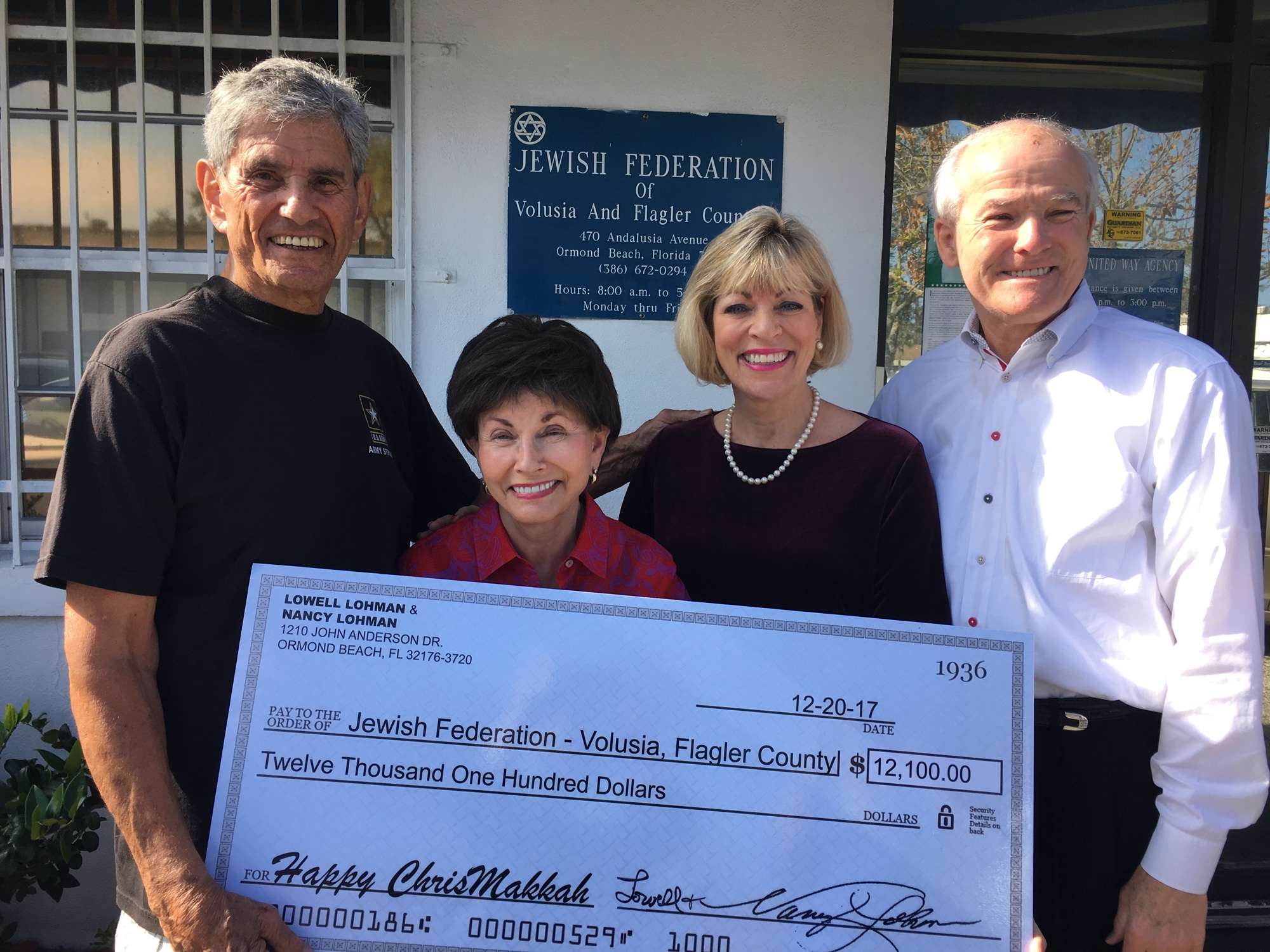 ewish Federation President Marvin Miller and Executive Director Gloria Max with Nancy and Lowell Lohman after they matched Lemerand's $12,000 donation on Friday, Dec. 22. Photo courtesy of the Jewish Federation