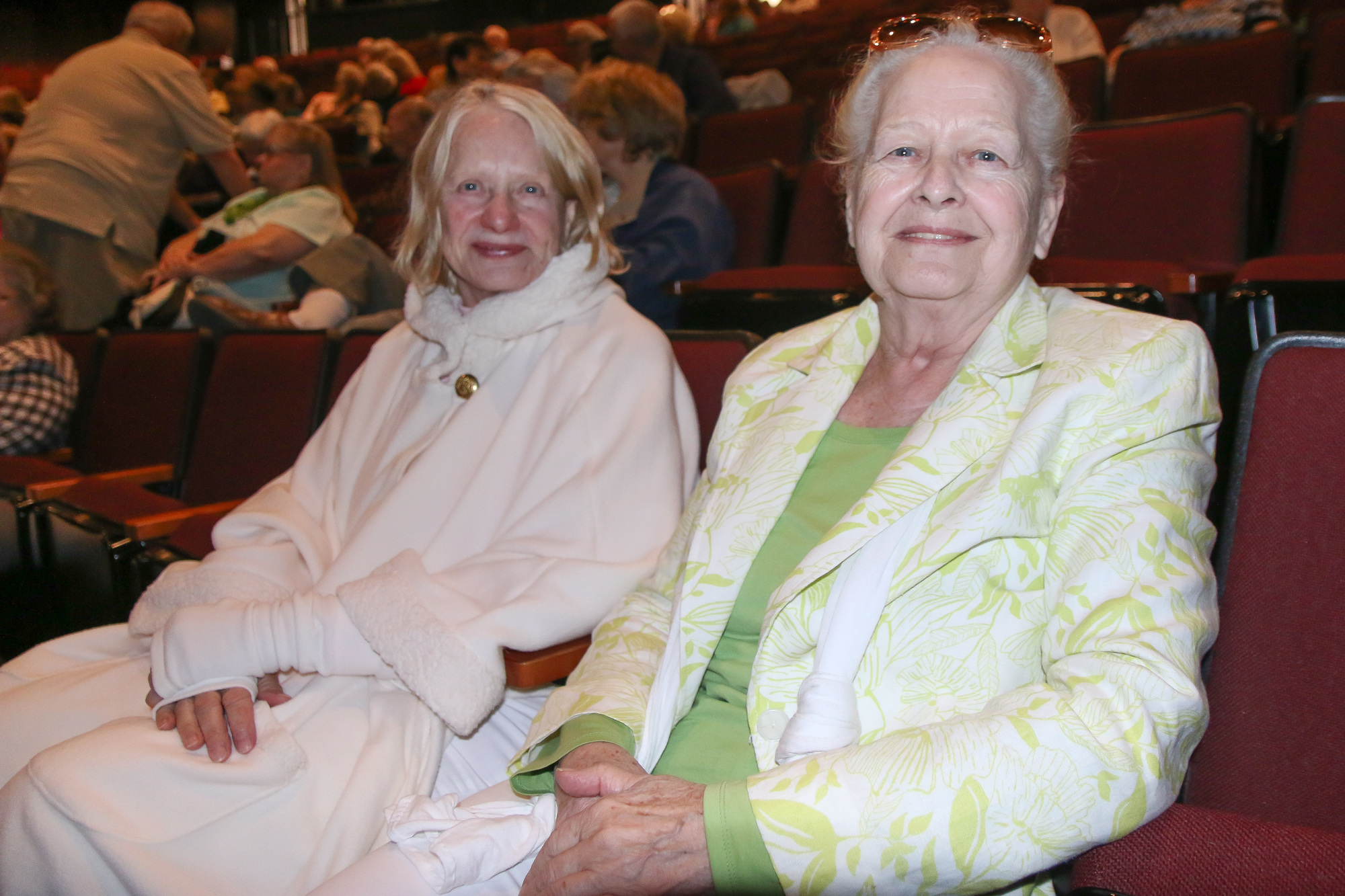 Sisters Joan Clay and Phyllis Knight reminisce about their youth in Steubenville, Ohio, where Clay went to school with Dean Martin. Photo by Paige Wilson