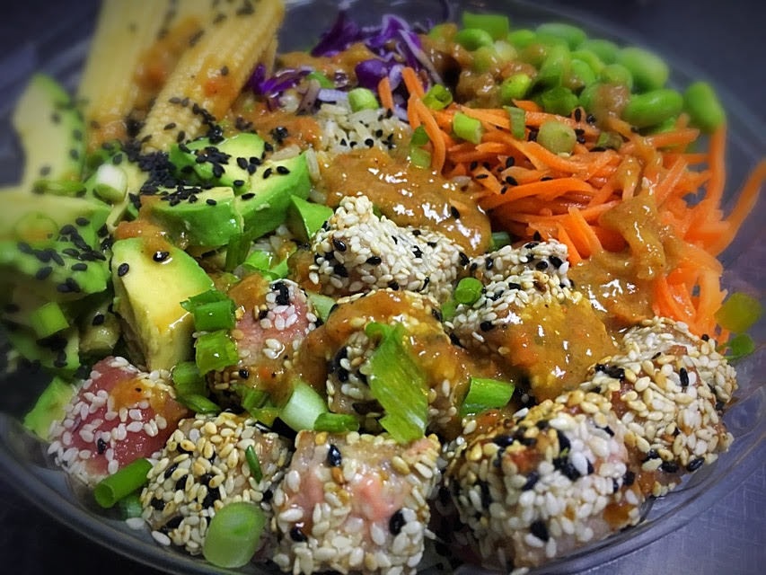 Poke bowl, made with your choice of seared tuna steak or salmon, brown rice, carrots, edamame, cabbage and ginger. Photo courtesy of Shaya Fogel