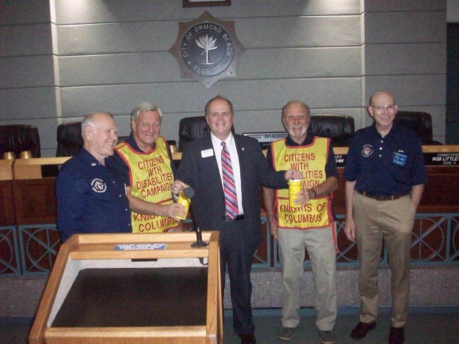 Jay Young, Jim Mowinski, Mayor Bill Partington, Robert Simcoe and John McCarthy as they start this year's Tootsie Roll drive. Photo courtesy of Knights of Columbus.