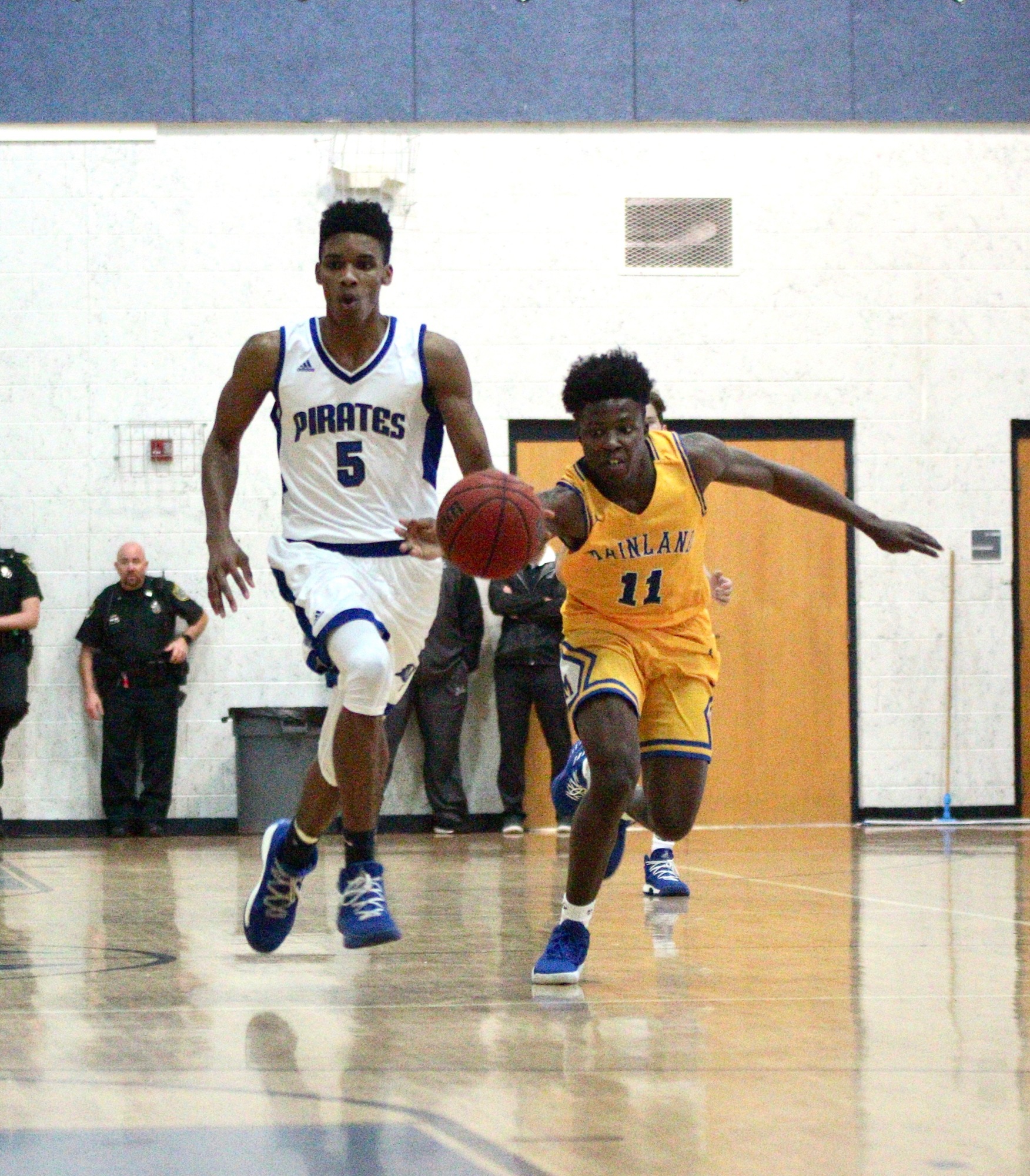 Mainland guard Taron Keith strips the ball from a Matanzas guard. Photo by Ray Boone