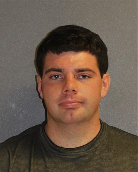 John Greenwood was arrested after making a bomb threat while naked at the Daytona Beach International Airport.