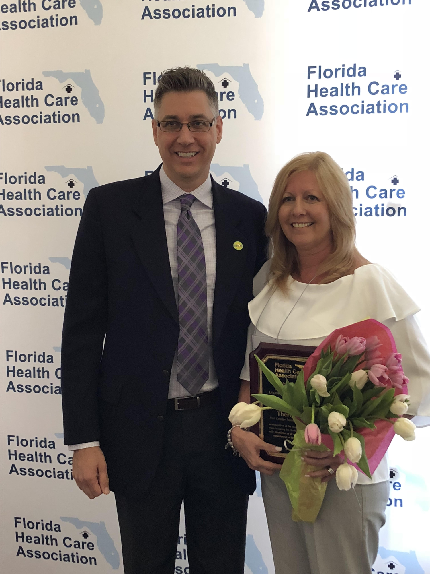 Theresa Finn, RN, was named nurse administrator of the year. Also shown is Robert Beckman, administrator of Port Orange Nursing and Rehab Center. Courtesy photo