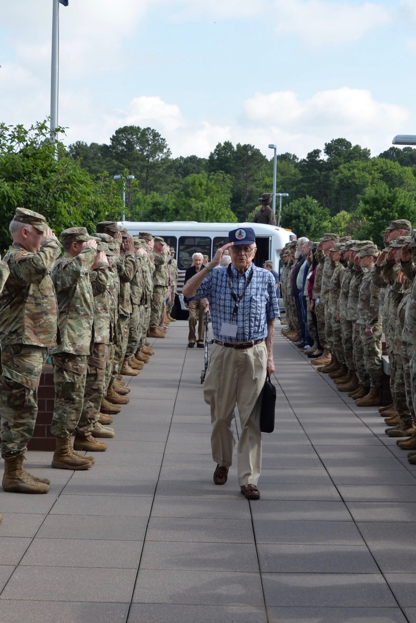 World War II Old Hickory veteran Peter Munger is saluted by its present day national guardsmen at this year's 30th Infantry Division reunion. Photo courtesy of the North Carolina National Guard