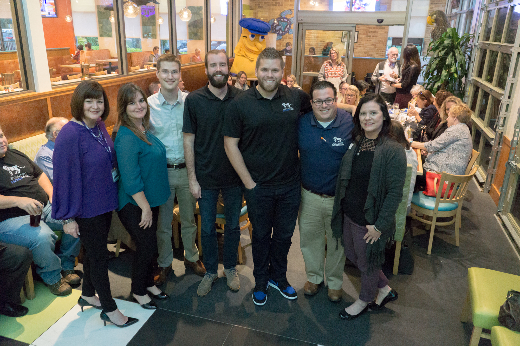 Ashley Wilson, Miranda Mills, Seth Jones, Matt Norris, Skip Simmons, Chris Cardino, and Jessyca Hogan show support for No Longer Fatherless at Mellow Mushroom