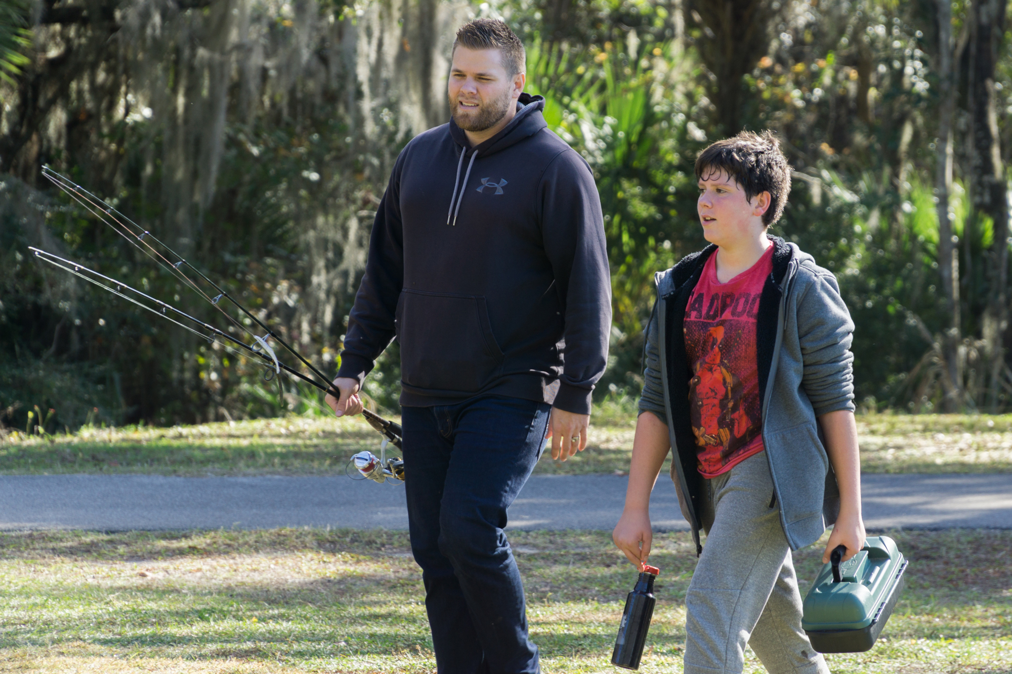 Skip and Liam walk back after their morning of fishing. Although empty handed, they have full hearts