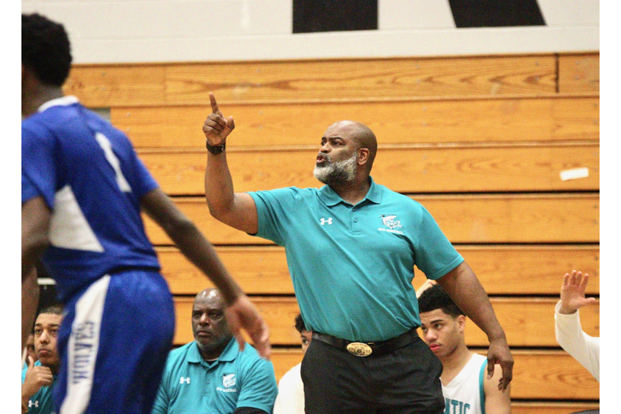 Former Atlantic basketball coach David Howard shouts instructions to his team during a game. File photo