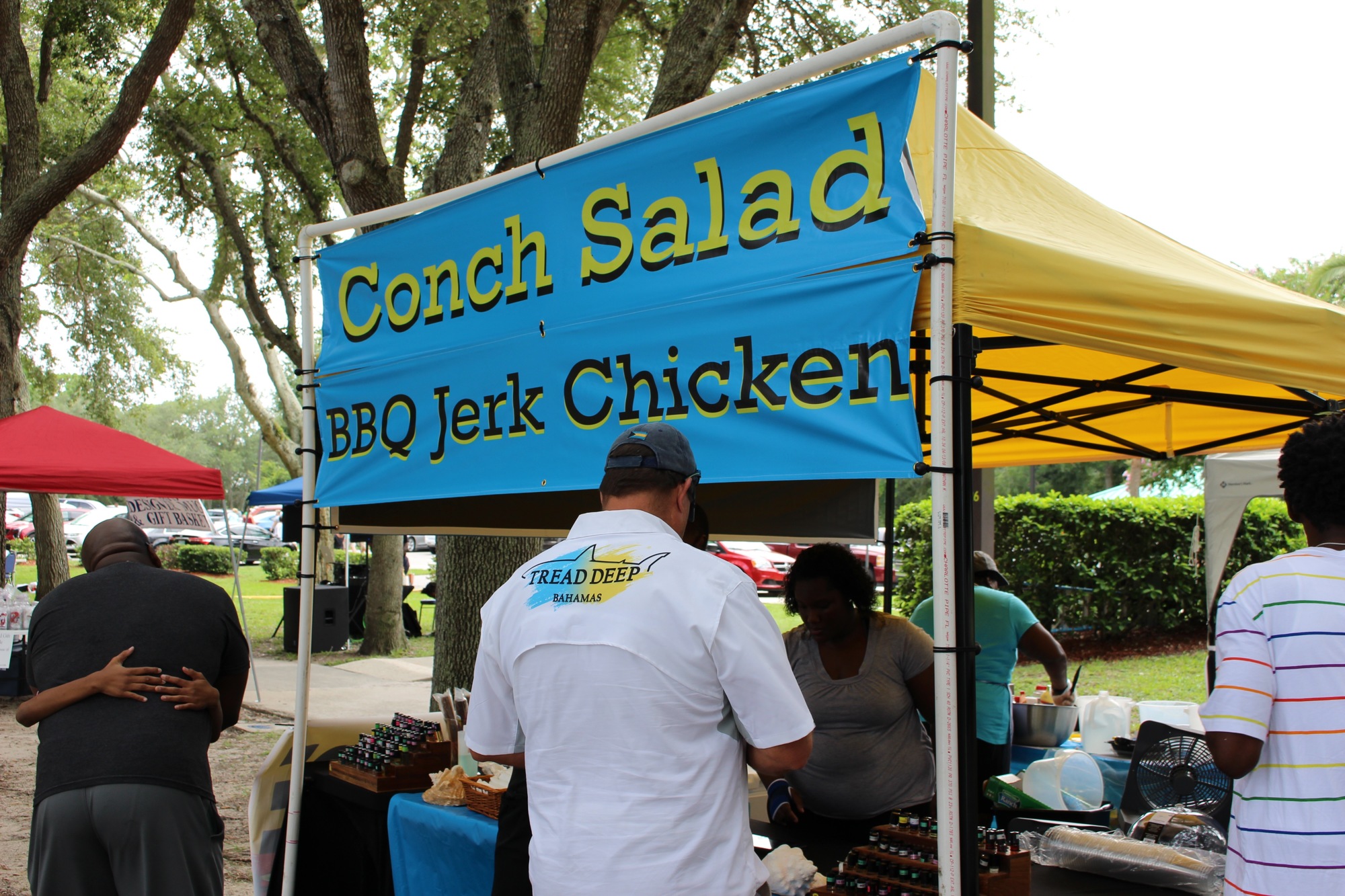 Customers line up and wait at The Conch Dynasty food truck at the Fourth-Annual Crab and Seafood Festival on Saturday, July 13. Photo by Alyssa Warner