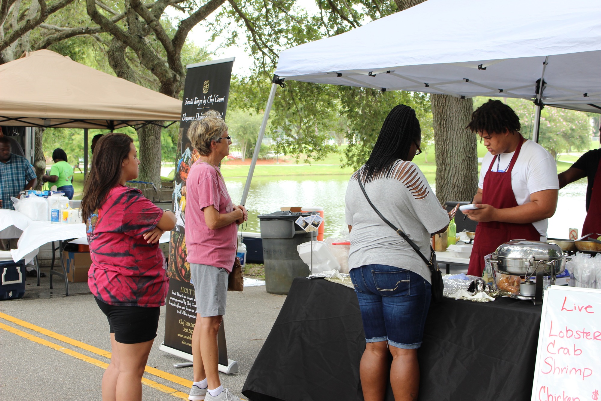 Customers waiting at for their orders at Sauté Kingz at the Fourth-Annual Crab and Seafood Festival on Saturday, July 13. Photo by Alyssa Warner