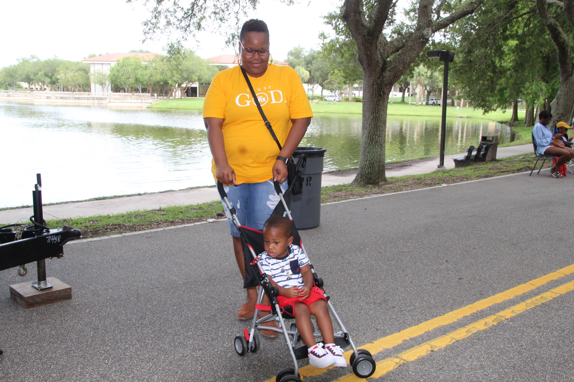 Lavonda West and her son, Tyri Dixon II, enjoy strolling past the many eateries at the Crab and Seafood Festival. Photo by Tanya Russo