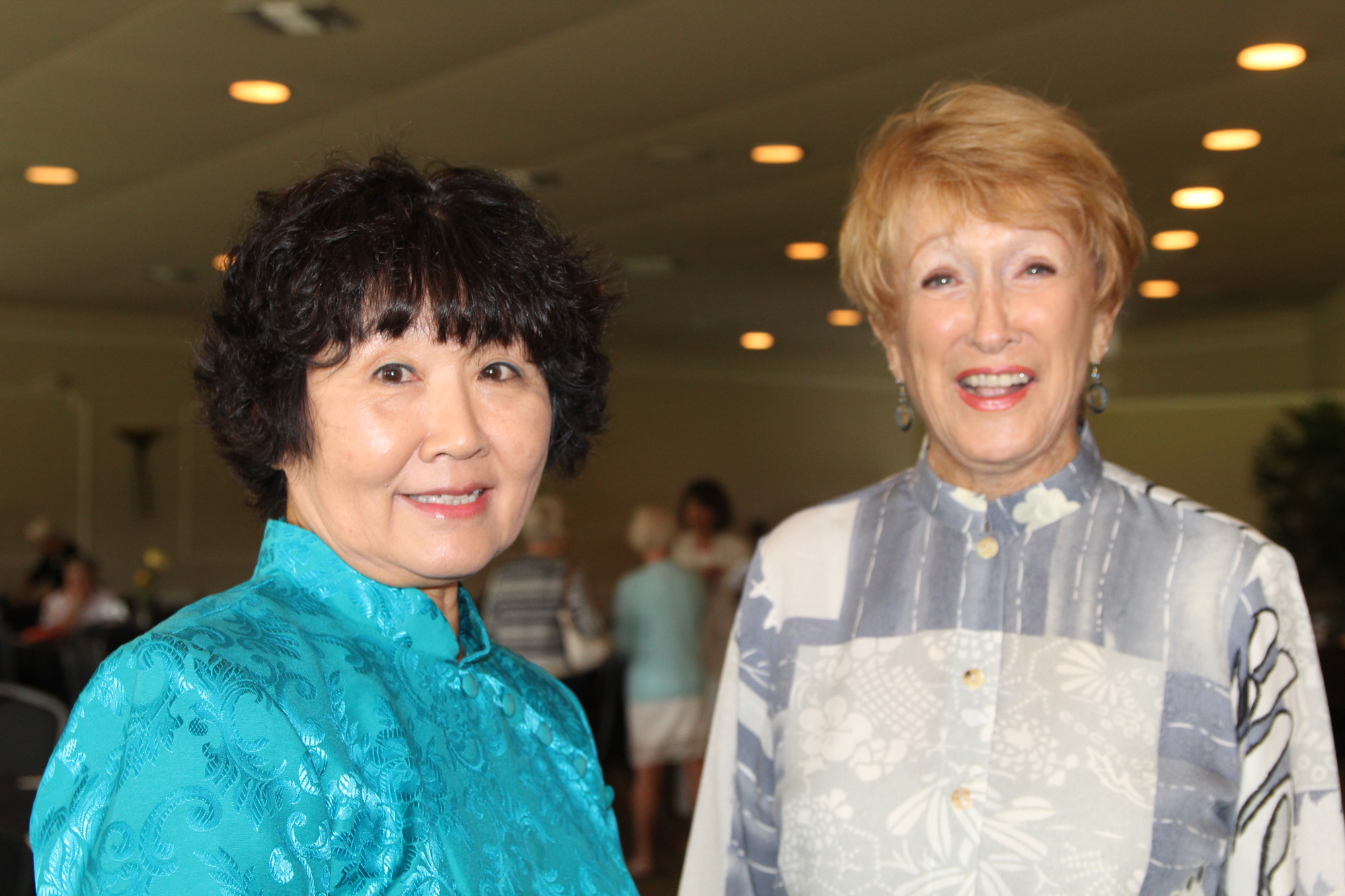 Kim Young and Eleanor Champlain peruse the fashion at the style show. Photo by Tanya Russo