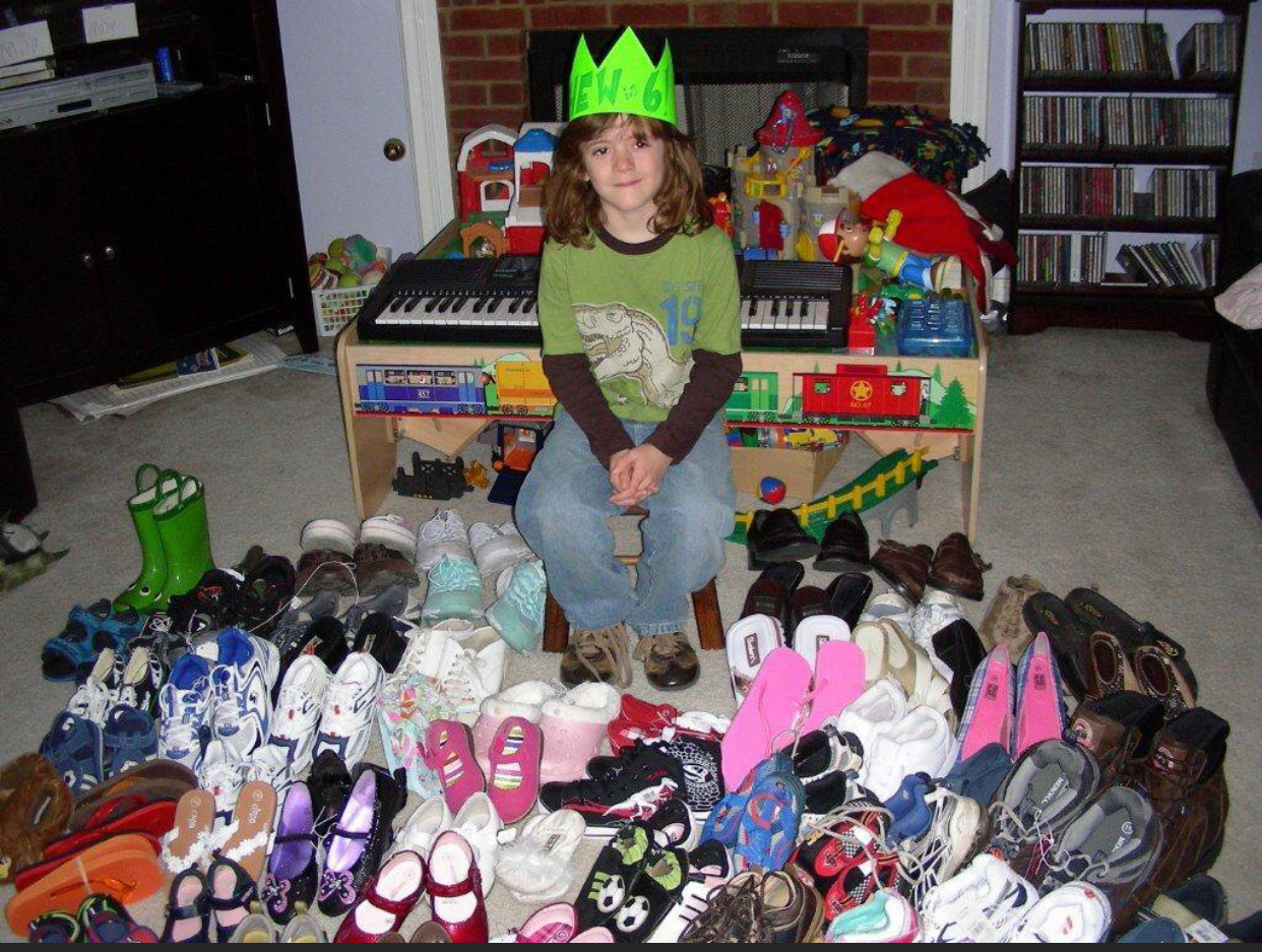 Matthew Monroe with his very first shoe drive collection when he was 6 years old. Courtesy photo