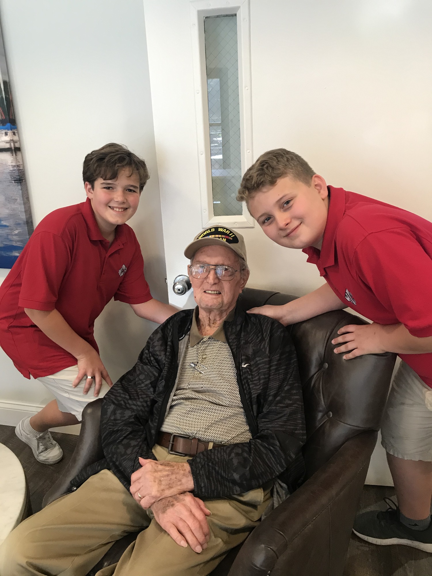 Jordan Stonaker and Austin Herman with 95-year-old Vietnam veteran Bill Swenson. Courtesy photo