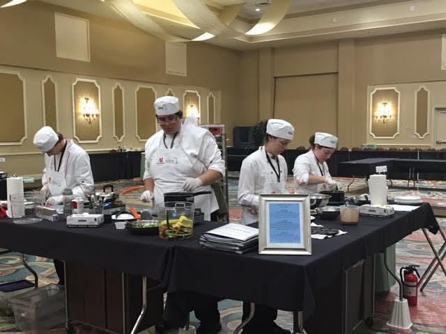The Culinary Competition Team, Nathanael Greisdorf, Alexandria Burell, Cameron Vail and Brandon Veleski, in action (Courtesy Photo).