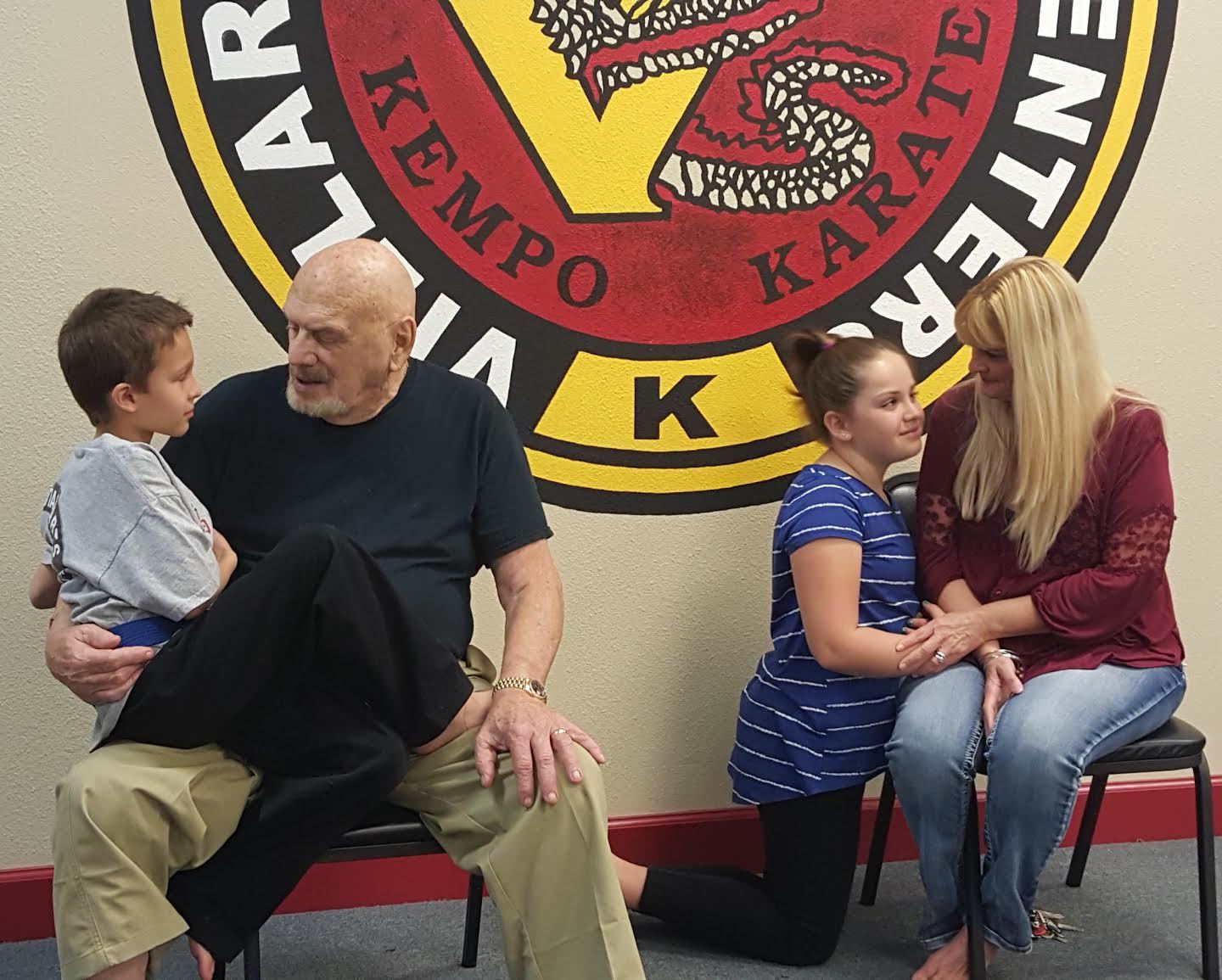 Children talk with their guardians about bullying in their schools (Courtesy photo).