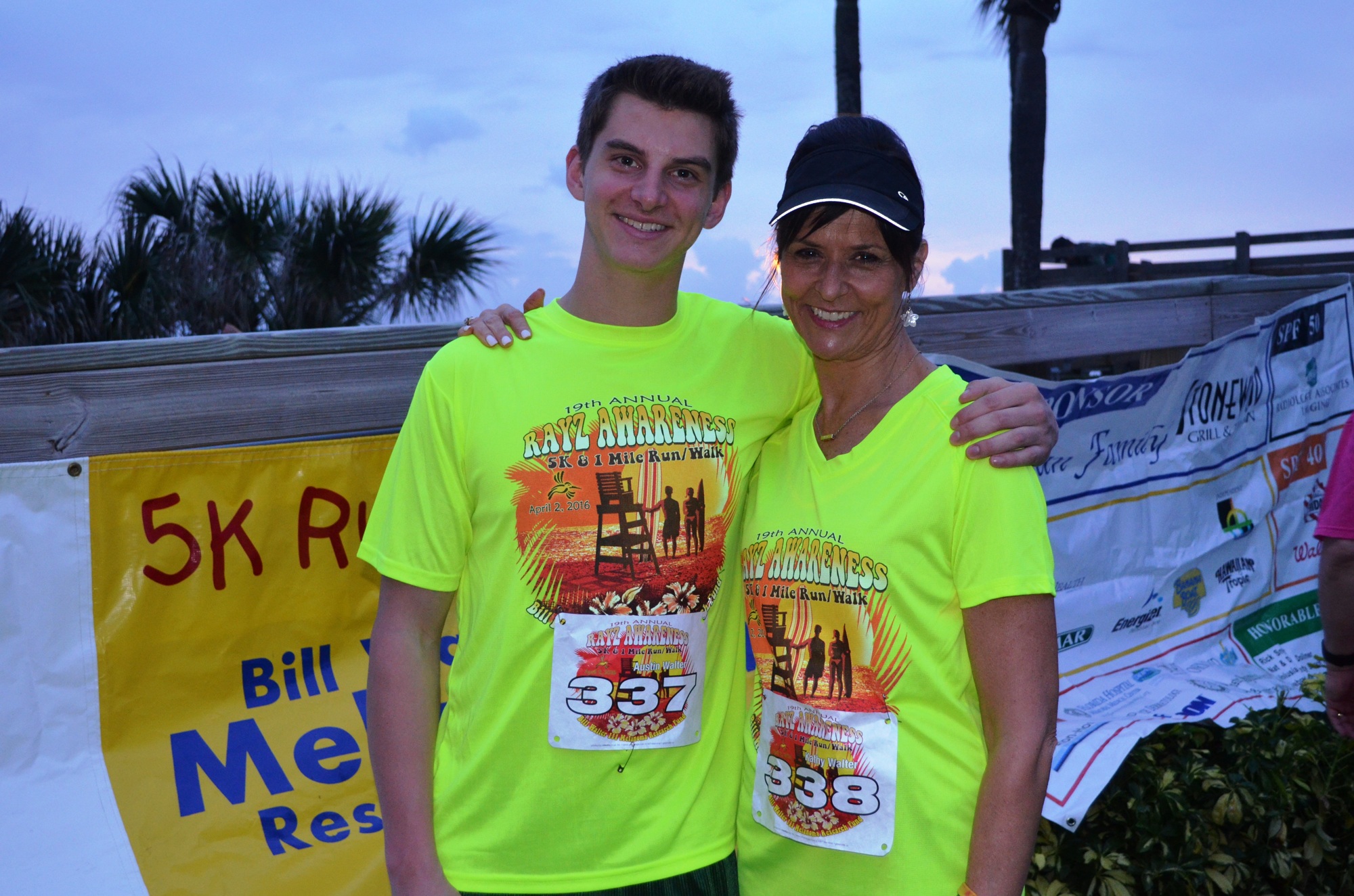 Austin and Kathy Walter, son and widow of Bill Walter III, get ready to run in the RayZ Awareness 5K. Photo by Wayne Grant