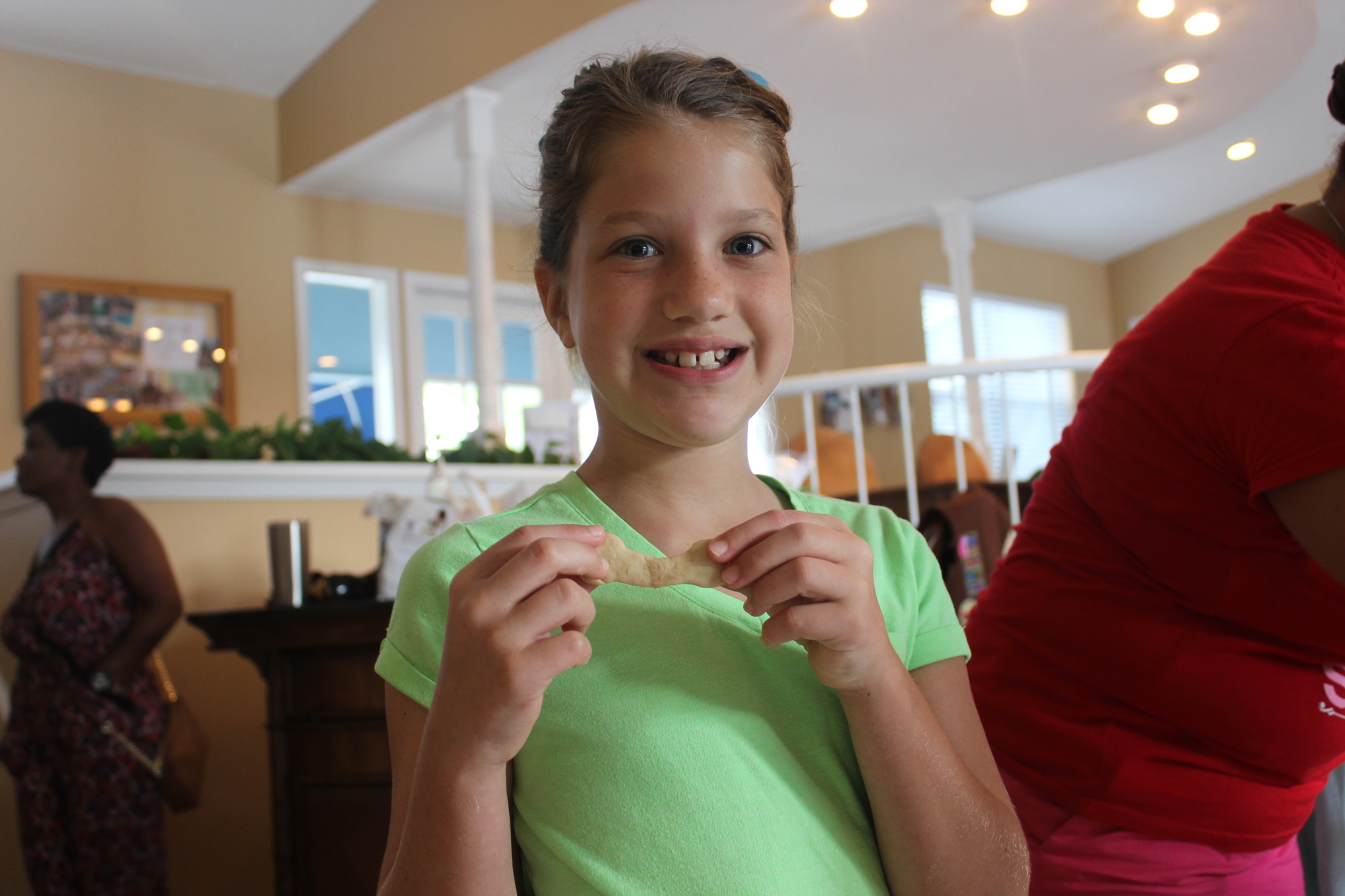 Noelle Harris, 8, was in charge of cutting the treats out of the dough (Photos by Emily Blackwood).