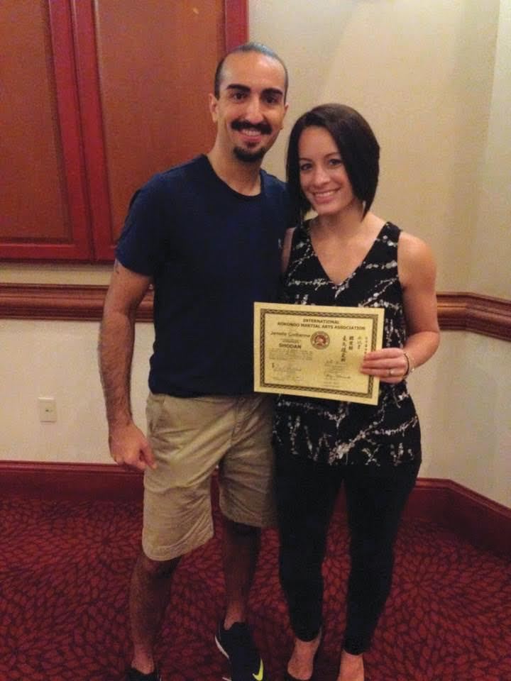Jenelle Codianne and her sensei, George Rego, in Connecticut last July after she was awarded Probationary Black Belt.