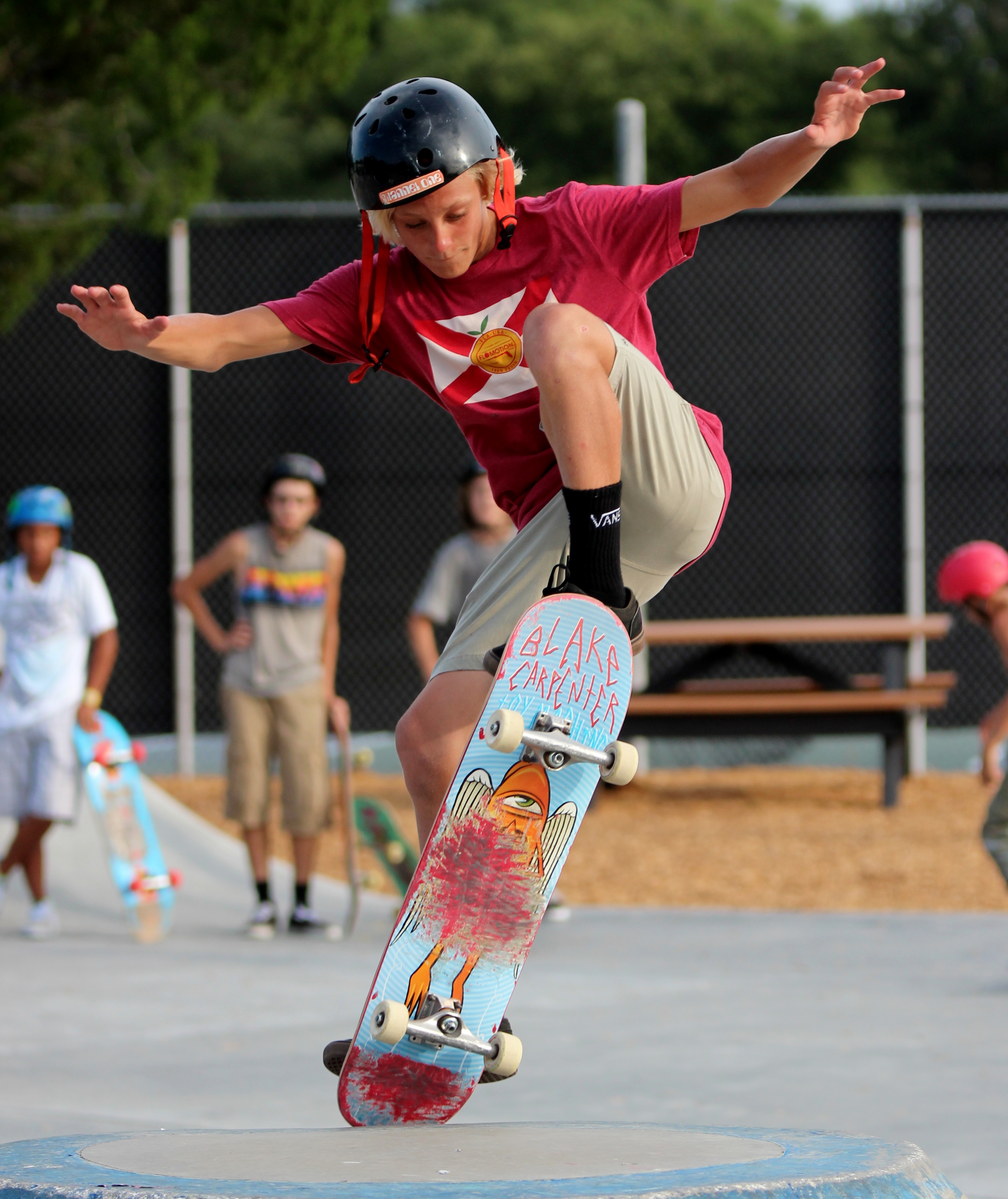 Blake Elmore performs an ollie over the hip.